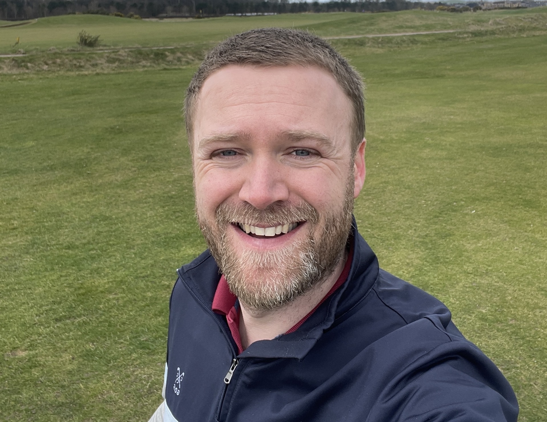 Andy smiling at golf