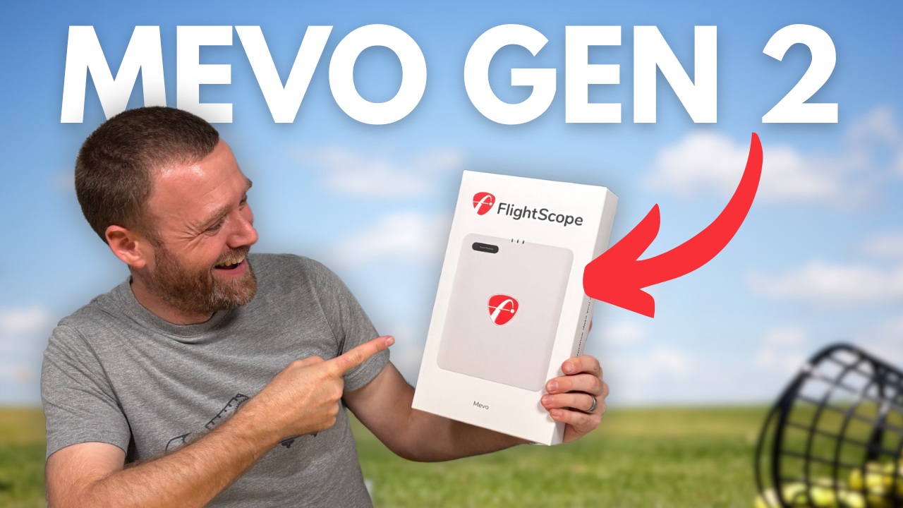 Andy smiling whilst holding the box of the brand new FlightScope Mevo Gen 2 portable golf launch monitor and simulator.