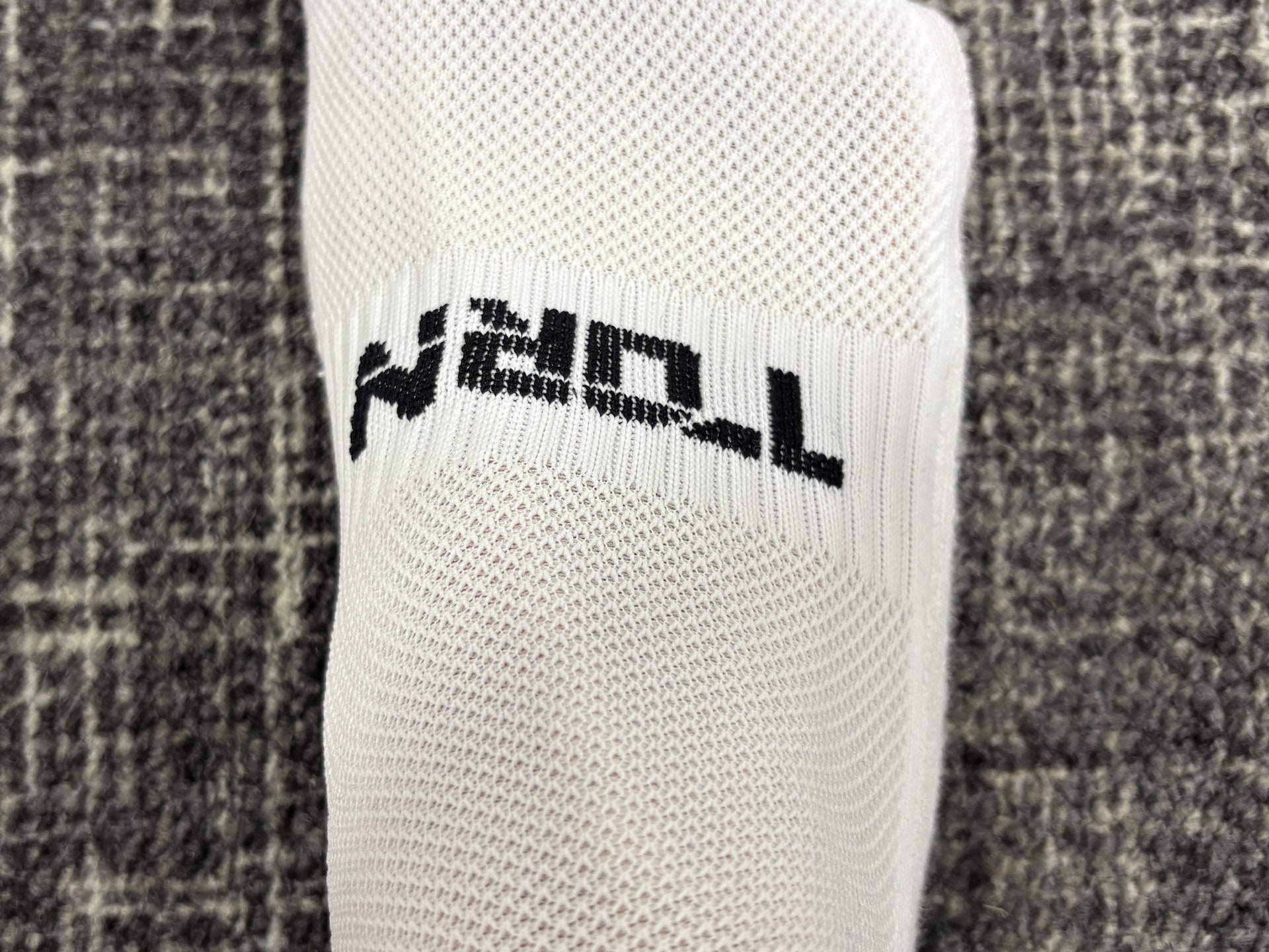 Top view of Torn Golf Socks