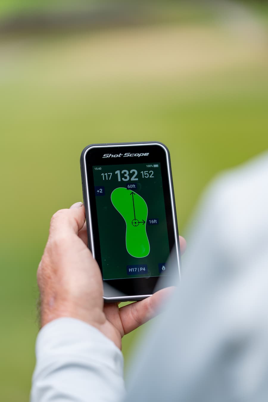 Shot Scope H50 Handheld on the golf course displaying the hole overview map