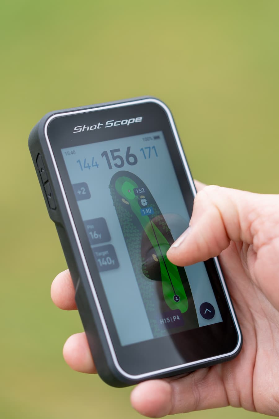 Shot Scope H50 Handheld on the golf course displaying adjustable hole overview map