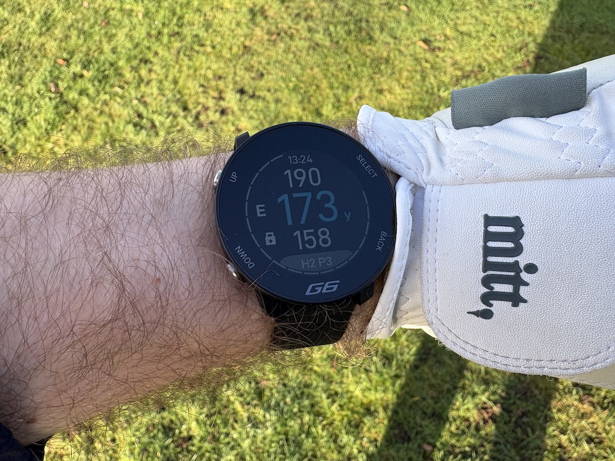 Shot Scope G6 GPS golf watch showing yardages on screen
