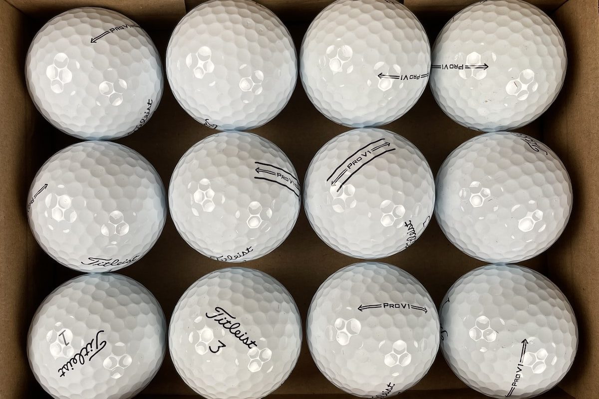 Close up of Mint grade Titleist PRO V1 lake golf balls from Mail Order Golf 2