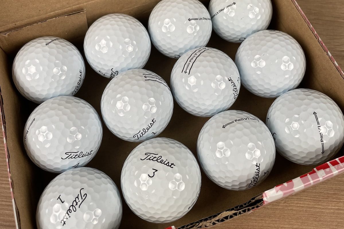 Mint grade Titleist PRO V1 lake golf balls from Mail Order Golf in box